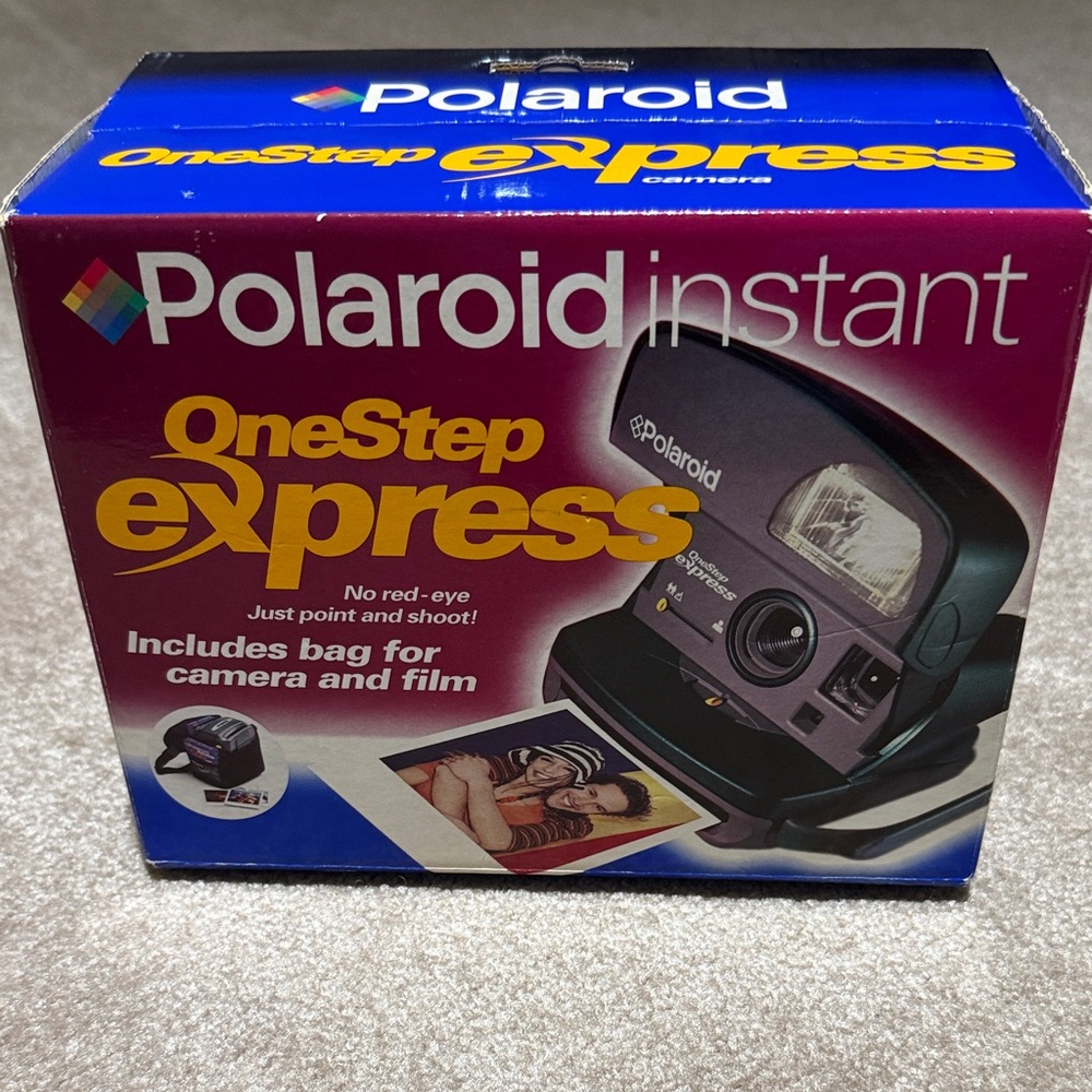 Polaroid OneStep Express Camera in Black and Purple Still in Box.